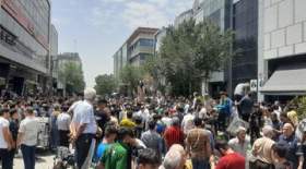 عکسی از مسعود پزشکیان در بازار شوش تهران محاصره شد